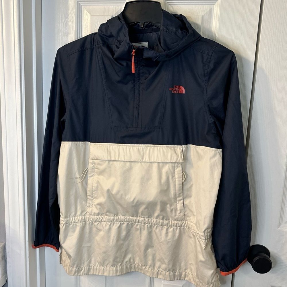 The North Face Windfall Dark Blue and Cream windbreaker jacket